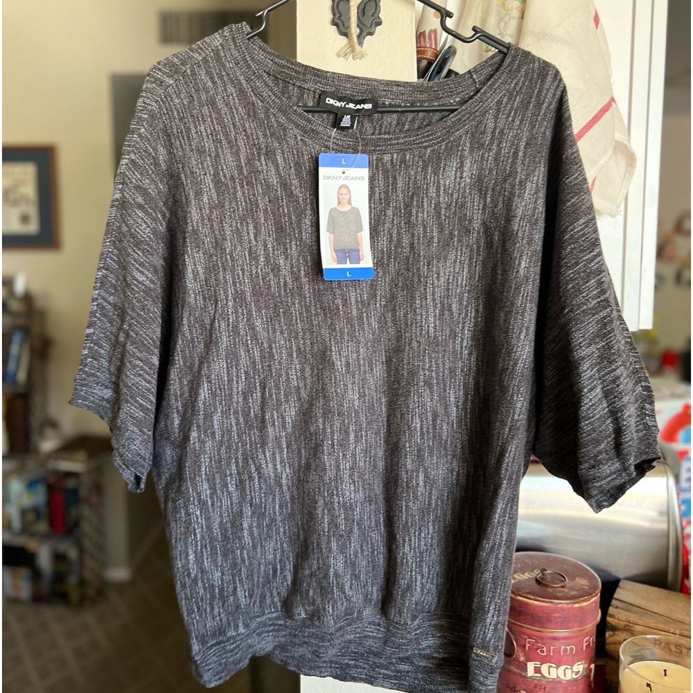 New with tags DKNY sweater. Size L